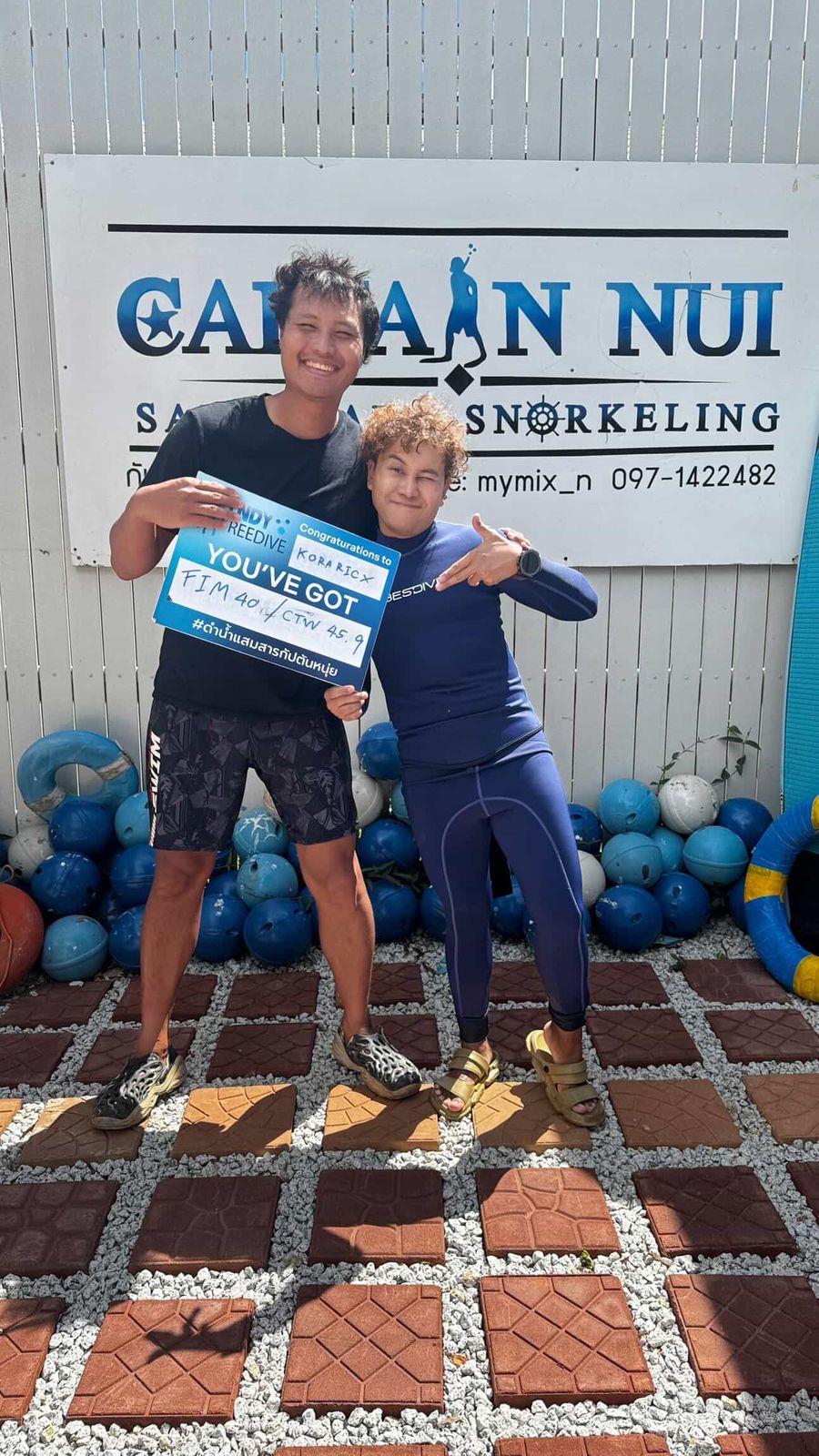 Athlete celebrating a coached 45 metre freediving personal best