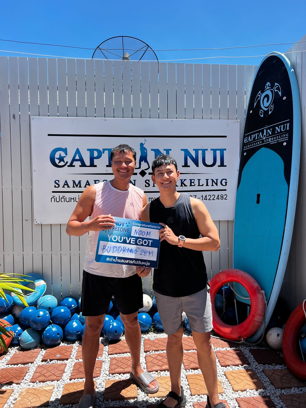 Freedivers celebrating buddy training and a 28 metre achievement